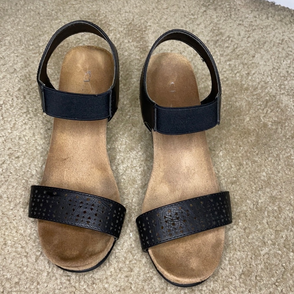Black wedges with strap detailing